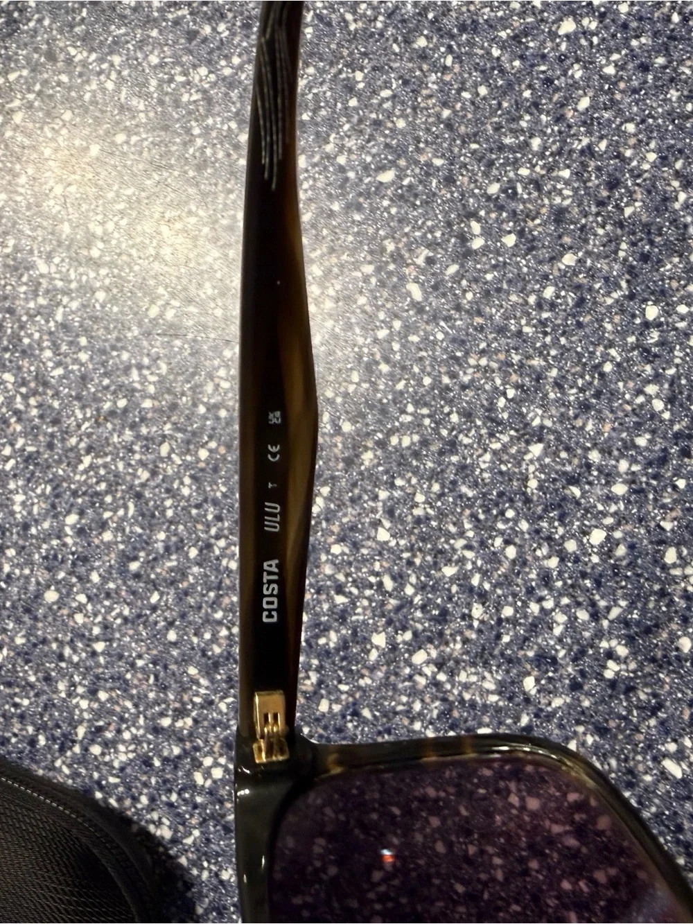 Costa Women’s Black Sunglasses with Purple-Tinted Lenses